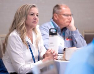 man and woman sitting at a table